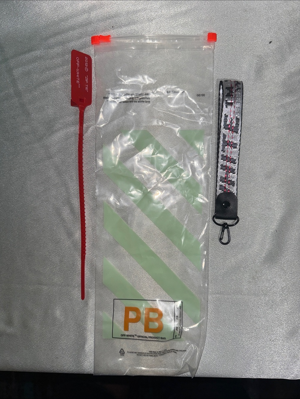 Off-White Clear Pouch with Silver Key Chain and Red ZipTie🔥New!